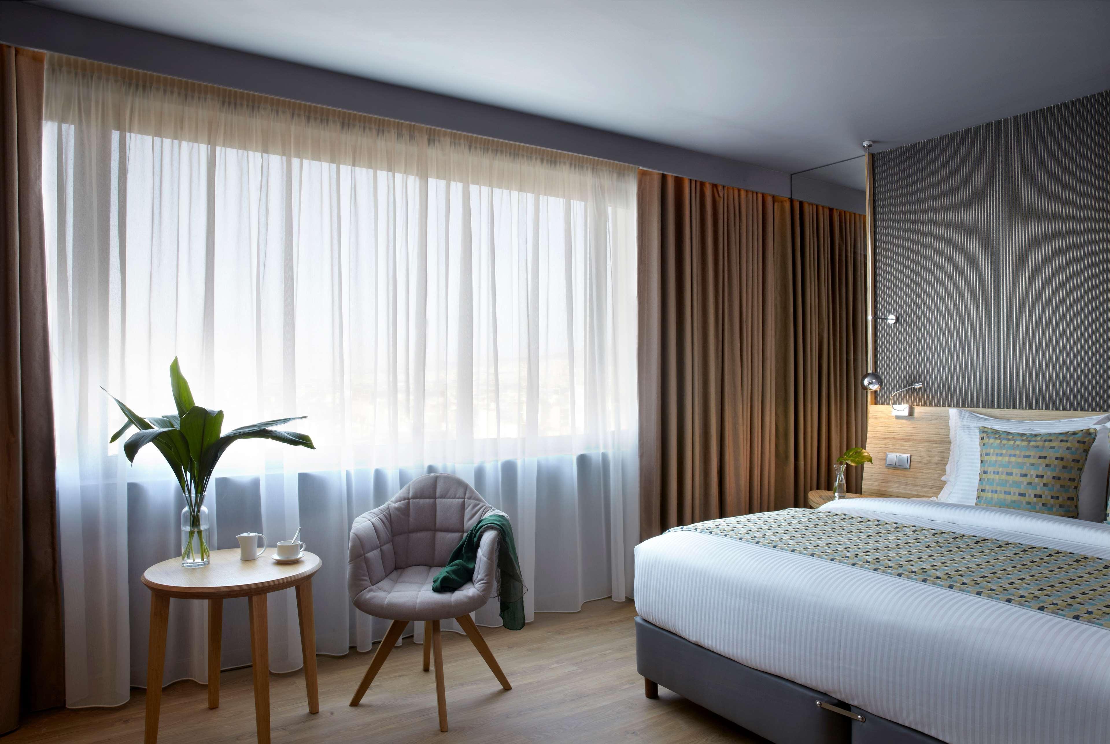 Hotel Wyndham Grand Ateny Zewnętrze zdjęcie A room at the hotel