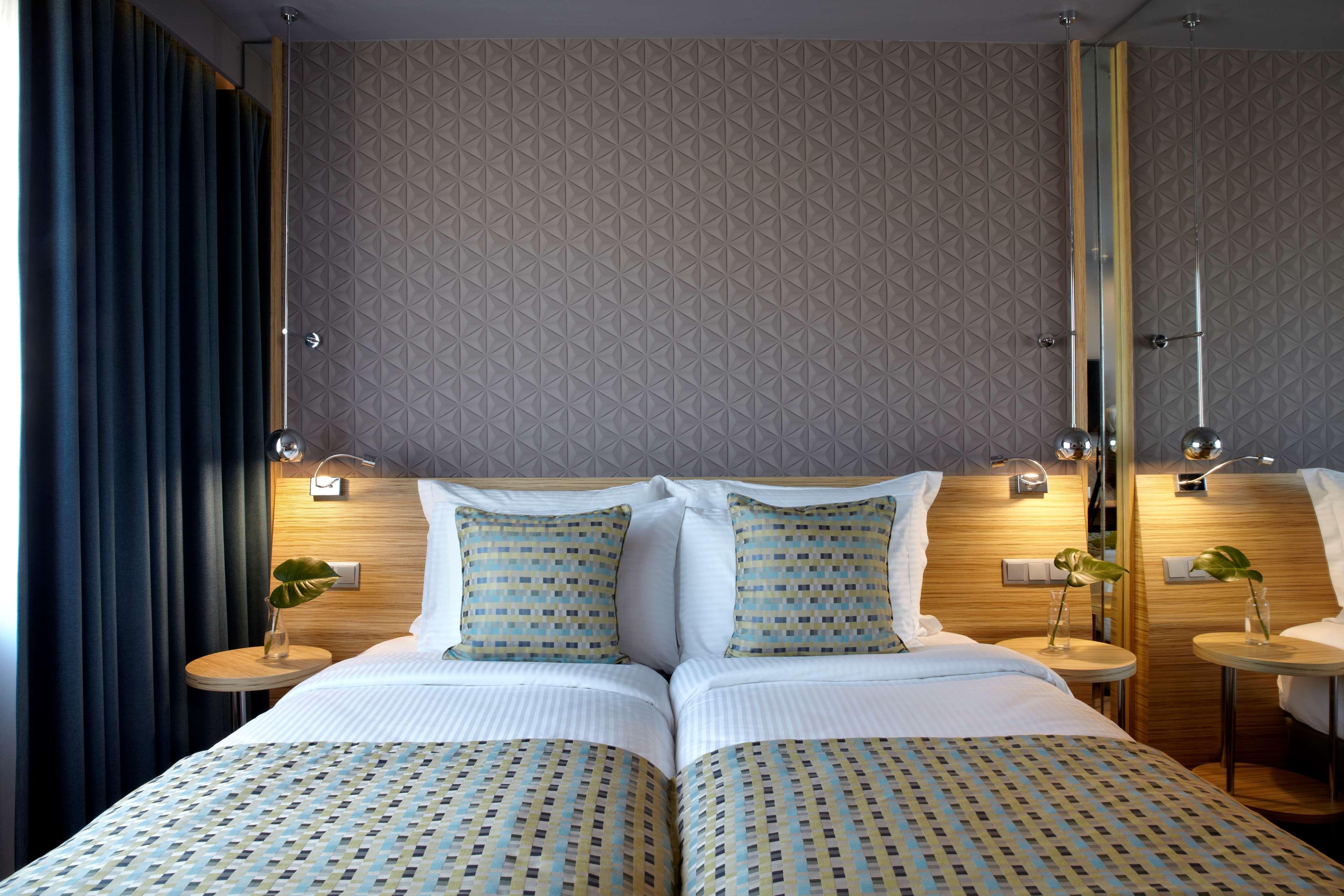 Hotel Wyndham Grand Ateny Zewnętrze zdjęcie A room at the hotel