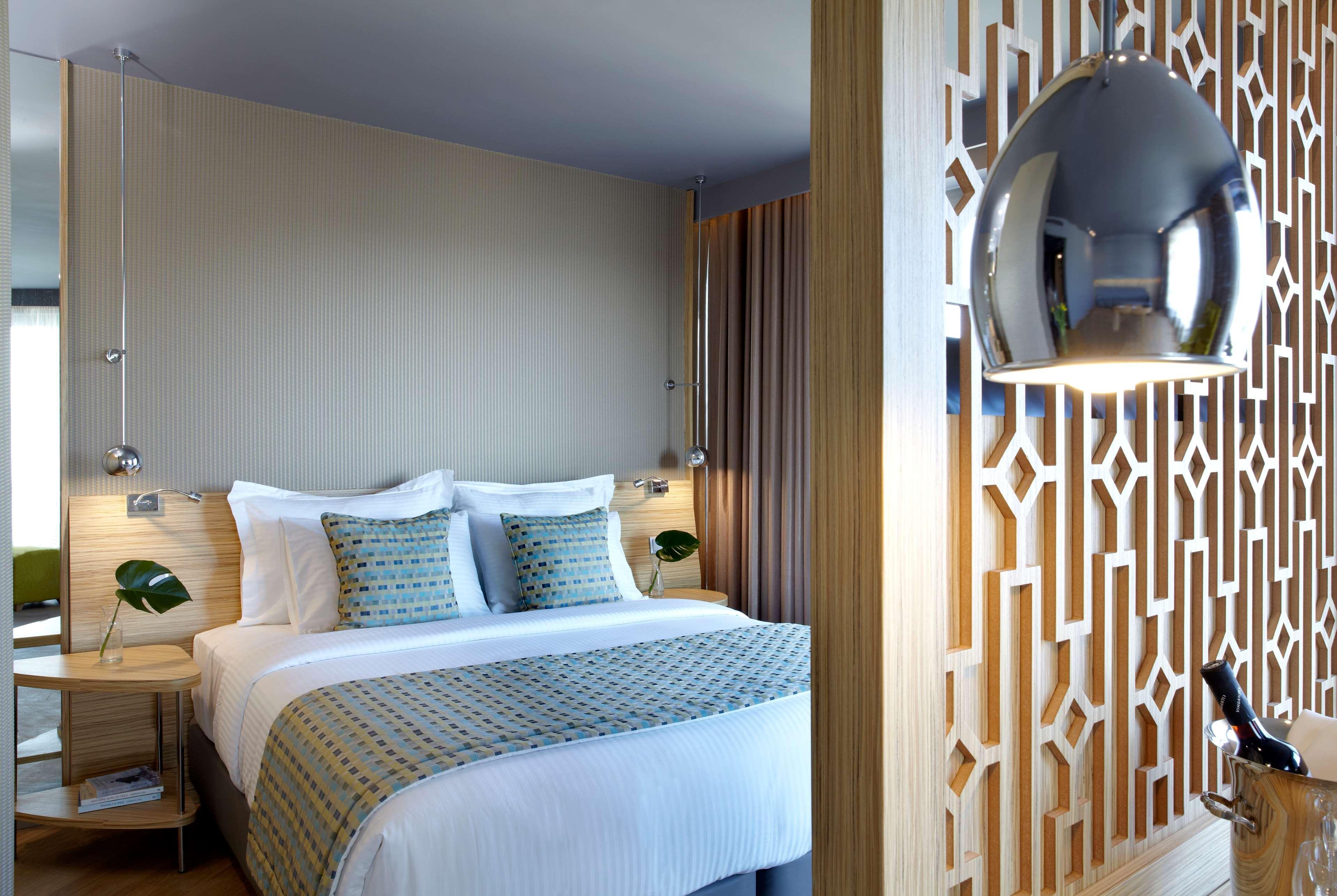 Hotel Wyndham Grand Ateny Zewnętrze zdjęcie A bedroom at the hotel