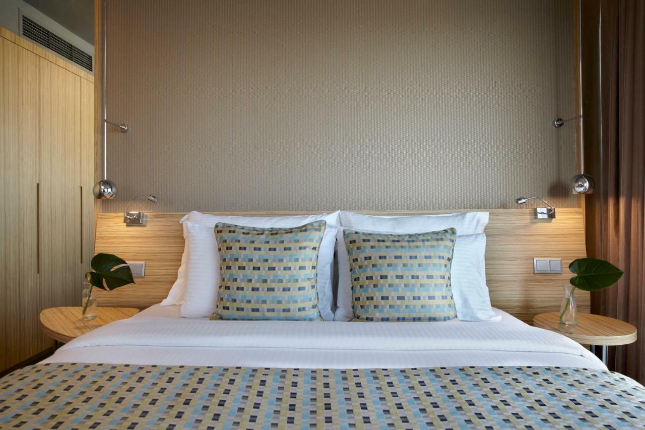 Hotel Wyndham Grand Ateny Zewnętrze zdjęcie A bed